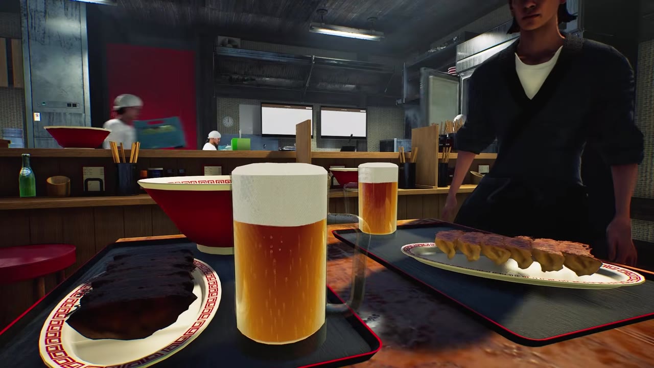 카운터에서 맥주와 교자를 손님에게 내놓는 장면